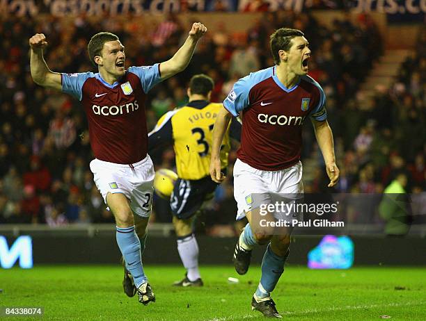 Gareth Barry of Aston Villa celebrates with Craig Gardner after scoring the second goal for Aston Villa during the Barclays Premier League match...