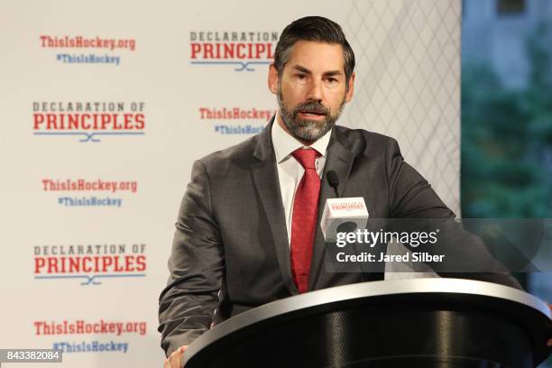Special Assistant to the Executive Director, Mathieu Schneider, speaks during the NHL Declaration of Principles in NYC press conference at Del...