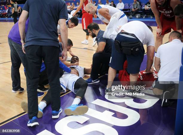 Thanasis Antetokounmpo of Greece, Aaron Cel of Poland receive medical attention during the FIBA Eurobasket 2017 Group A match between Greece and...