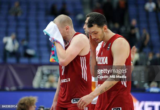 Damian Kulig and Aaron Cel of Poland appear dejected during the FIBA Eurobasket 2017 Group A match between Greece and Poland on September 6, 2017 in...