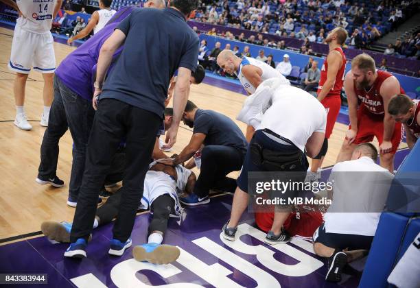 Thanasis Antetokounmpo of Greece, Aaron Cel of Poland receive medical attention during the FIBA Eurobasket 2017 Group A match between Greece and...