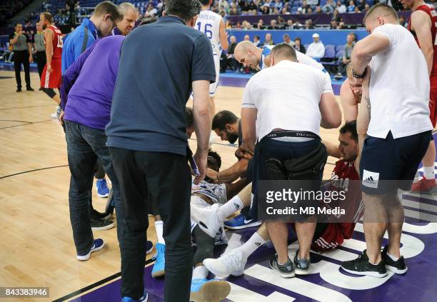 Thanasis Antetokounmpo of Greece, Aaron Cel of Poland receive medical attention during the FIBA Eurobasket 2017 Group A match between Greece and...