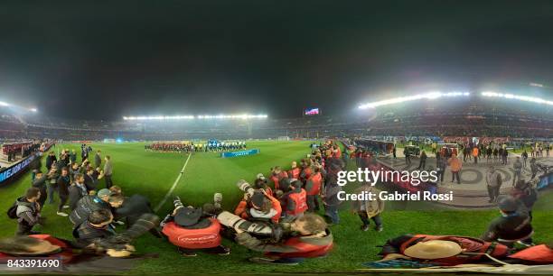 Players of Venezuela and Argentina stand prior a match between Argentina and Venezuela as part of FIFA 2018 World Cup Qualifiers at Monumental...