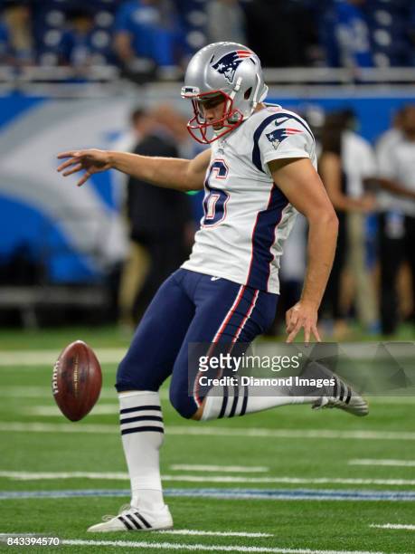 Punter Ryan Allen of the New England Patriots punts the ball prior to a preseason game on August 25, 2017 against the Detroit Lions at Ford Field in...