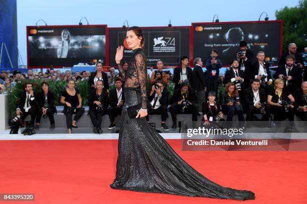 Gloria Bellicchi walks the red carpet ahead of the 'Ammore E Malavita' screening during the 74th Venice Film Festival at Sala Grande on September 6,...