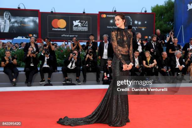 Gloria Bellicchi walks the red carpet ahead of the 'Ammore E Malavita' screening during the 74th Venice Film Festival at Sala Grande on September 6,...