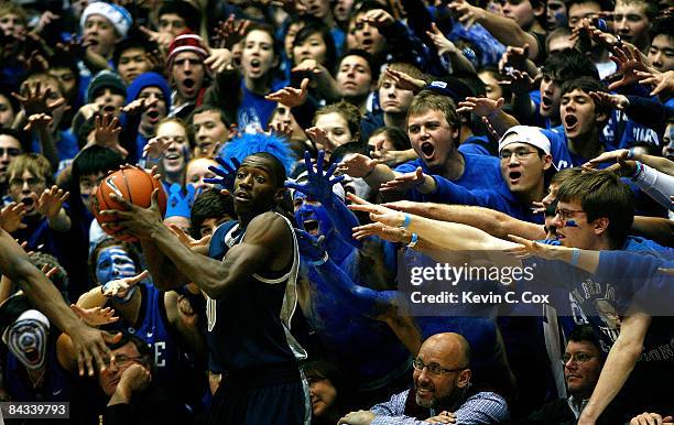 The Cameron Crazies heckle Jason Clark of the Georgetown Hoyas during the Blue Devils 76-67 win on January 17, 2009 at Cameron Indoor Stadium in...