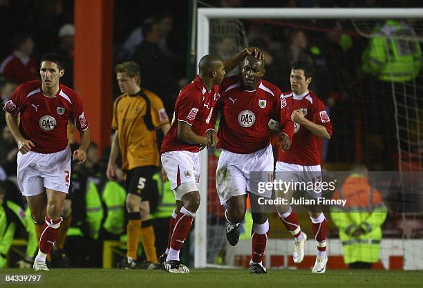 Dele Adebola of Bristol City is congratulated after scoring a goal during the Coca-Cola Championship match between Bristol City and Wolverhampton...