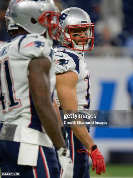 Wide receiver Julian Edelman of the New England Patriots stands on the field prior to a preseason game on August 25, 2017 against the Detroit Lions...