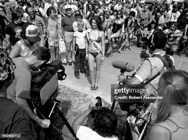 Television crew tapes a segment for the ABC television network's 'Real People' program featuring 'Miss Real People' in Daytona Beach, Florida, during...