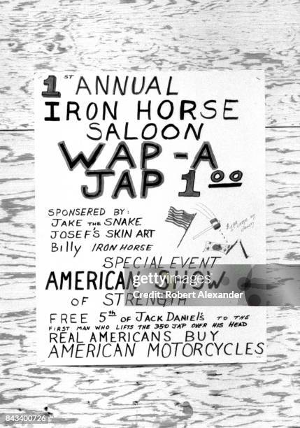 Sign promotes a 'Wap-A-Jap" fundraiser in Daytona Beach, Florida, during the city's 1983 Bike Week. The annual motorcycle event and rally has...