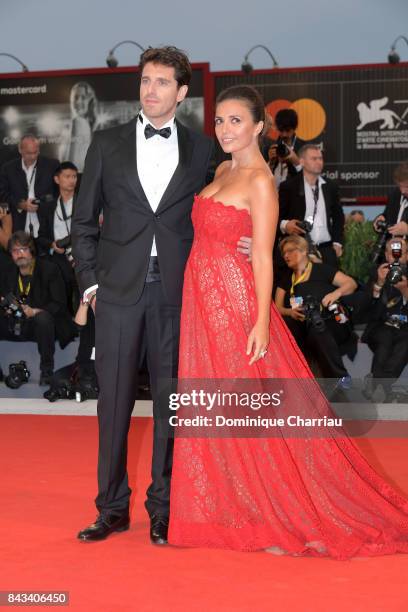 Serena Rossi and Giampaolo Morelli walk the red carpet ahead of the 'Ammore E Malavita' screening during the 74th Venice Film Festival at Sala Grande...