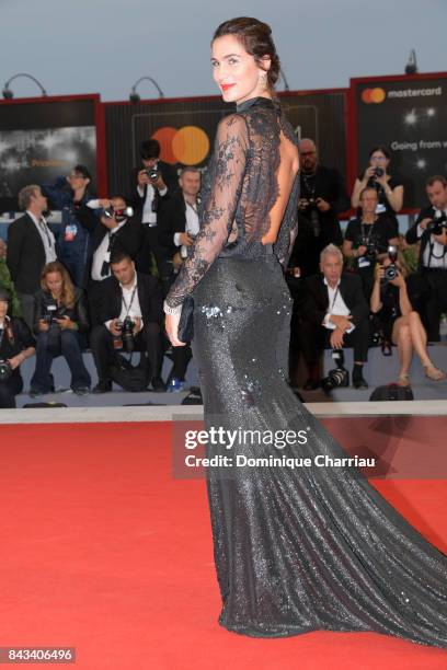 Gloria Bellicchi walks the red carpet ahead of the 'Ammore E Malavita' screening during the 74th Venice Film Festival at Sala Grande on September 6,...