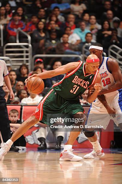 Charlie Villanueva of the Milwaukee Bucks posts up against Al Thornton of the Los Angeles Clippers at Staples Center on January 17, 2009 in Los...