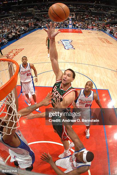Dan Gadzuric of the Milwaukee Bucks puts up a shot against the Los Angeles Clippers at Staples Center on January 17, 2009 in Los Angeles, California....