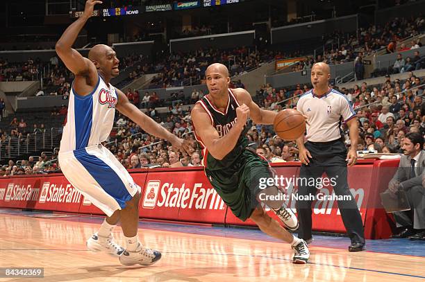 Richard Jefferson of the Milwaukee Bucks drives against Mardy Collins of the Los Angeles Clippers at Staples Center on January 17, 2009 in Los...