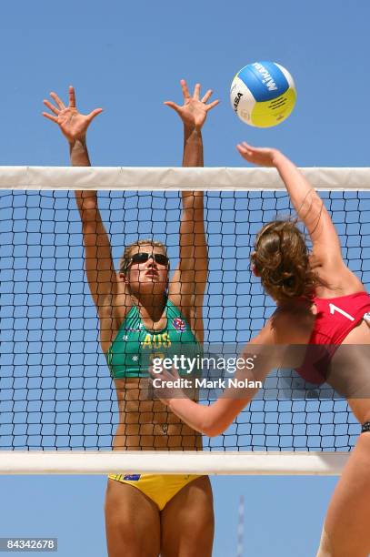 Zina Stone of Australia blocks at the net in the gold medal play off against the USA during the Beach Volleyball on day five of the Australian Youth...