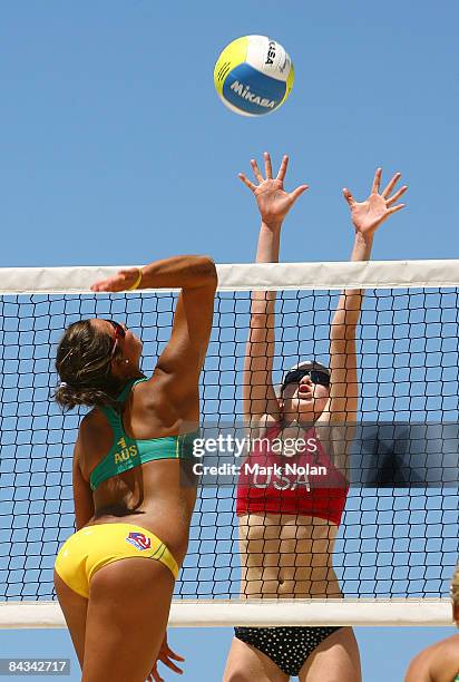 Mariafe Artacho of Australia spikes at the net in the gold medal play off against the USA during the Beach Volleyball on day five of the Australian...