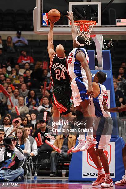 Richard Jefferson of the Milwaukee Bucks has his shot challenged by Al Thornton of the Los Angeles Clippers at Staples Center on January 17, 2009 in...
