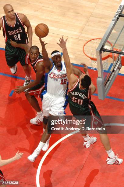 Al Thornton of the Los Angeles Clippers goes up for a shot against Dan Gadzuric of the Milwaukee Bucks at Staples Center on January 17, 2009 in Los...