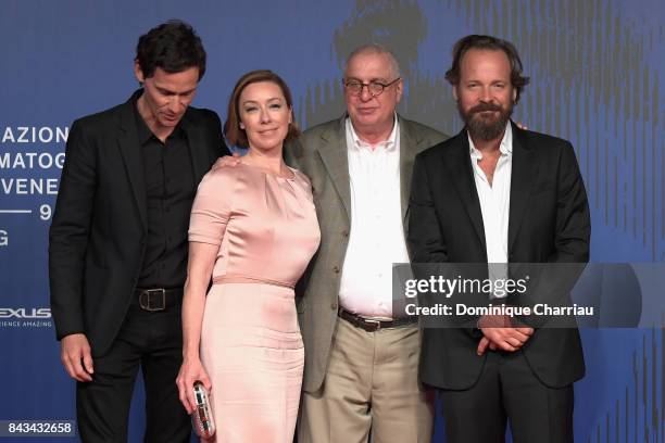 Christian Camargo, Molly Parker, Errol Morris and Peter Sarsgaard walk the red carpet ahead of the 'Wormwood' screening during the 74th Venice Film...