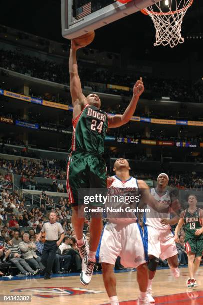 Richard Jefferson of the Milwaukee Bucks puts up a shot against Eric Gordon of the Los Angeles Clippers at Staples Center on January 17, 2009 in Los...