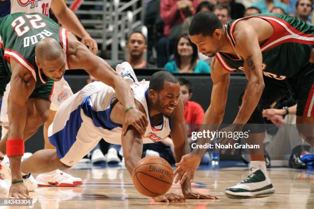 Fred Jones of the Los Angeles Clippers dives for a loose ball during a game against the Milwaukee Bucks at Staples Center on January 17, 2009 in Los...