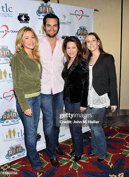 Jackie Johnson, Scott Elrod, Leyna Nguyen and Lisa Sigell attend the Texas Hold' Em Celebrity Poker Tournament on January 17, 2009 at the Commerce...