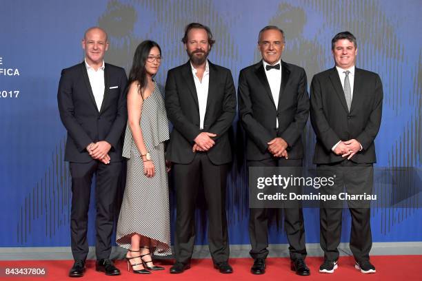 Peter Sarsgaard , festival director Alberto Barbera and guests walk the red carpet ahead of the 'Wormwood' screening during the 74th Venice Film...