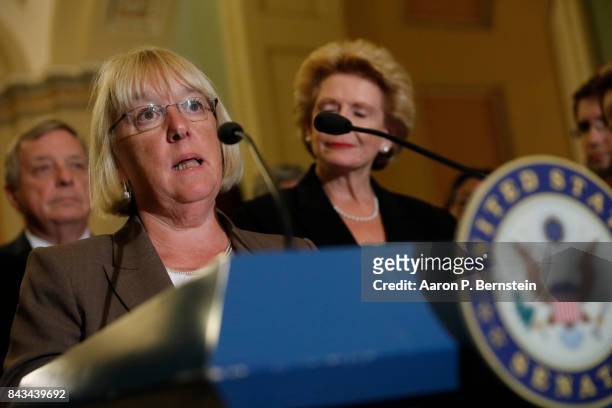 Senator Patty Murray speaks with reporters following the weekly Senate Democratic policy luncheon at the U.S. Capitol September 6, 2017 in...