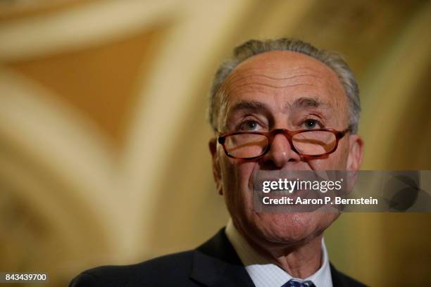 Senate Minority Leader Chuck Schumer speaks with reporters following the weekly Senate Democratic policy luncheon at the U.S. Capitol September 6,...