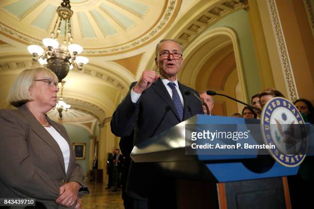 Senate Minority Leader Chuck Schumer, accompanied by Sen. Patty Murray , speaks with reporters following the weekly Senate Democratic policy luncheon...
