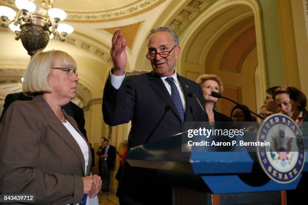 Senate Minority Leader Chuck Schumer, accompanied by Senator Patty Murray , speaks with reporters following the weekly Senate Democratic policy...