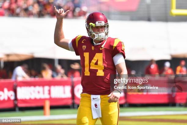 Sam Darnold warms up before a college football game between the Western Michigan Broncos and the USC Trojans on September 2 at Los Angeles Memorial...