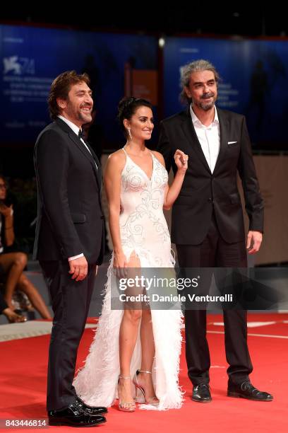 Javier Bardem, Penelope Cruz and Fernando Leon de Aranoa walk the red carpet ahead of the 'Loving Pablo' screening during the 74th Venice Film...