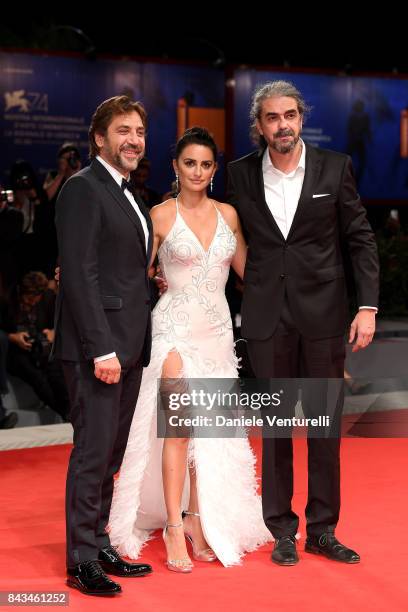 Javier Bardem, Penelope Cruz and Fernando Leon de Aranoa walk the red carpet ahead of the 'Loving Pablo' screening during the 74th Venice Film...