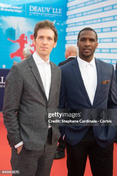 Director and actor Daryl Wein and US actor Jerod Haynes pose as they arrive for the screening of "The Music of Silence", during the 43rd Deauville...