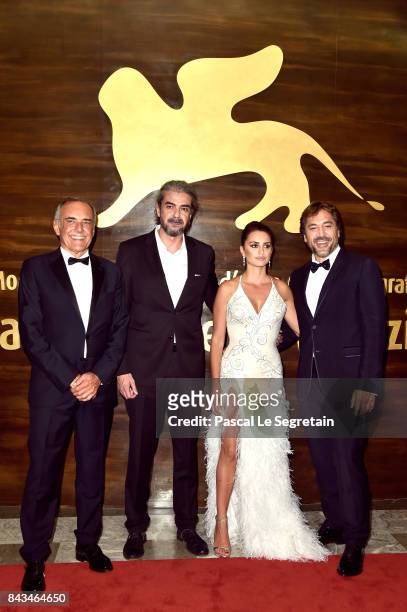 Festival director Alberto Barbera, Fernando Leon de Aranoa, Penelope Cruz and Javier Bardem walk the red carpet ahead of the 'Loving Pablo' screening...