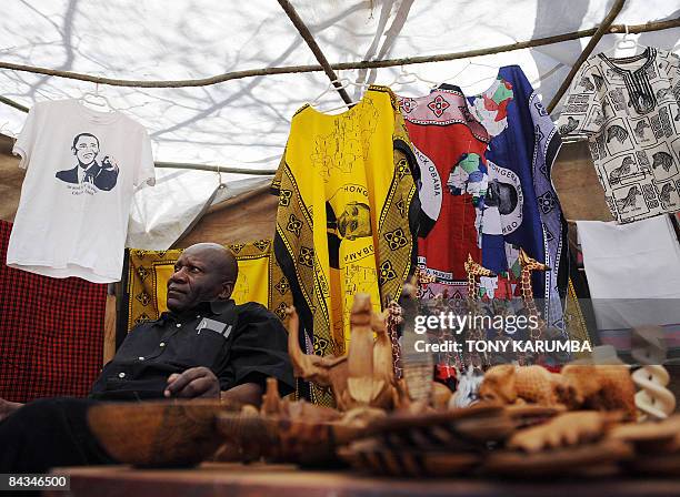 Kenyan entrepreneur sells merchandise decorated with the image of America's President-elect, Barack Obama at Nyang'oma in Kogelo, January 18, 2009...