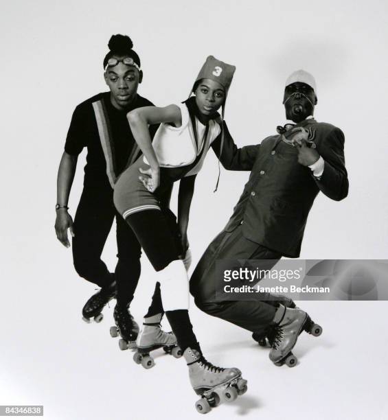 Fashion designers Andre Walker, Pierre, and Robin on rollerskates, 1987. New York.