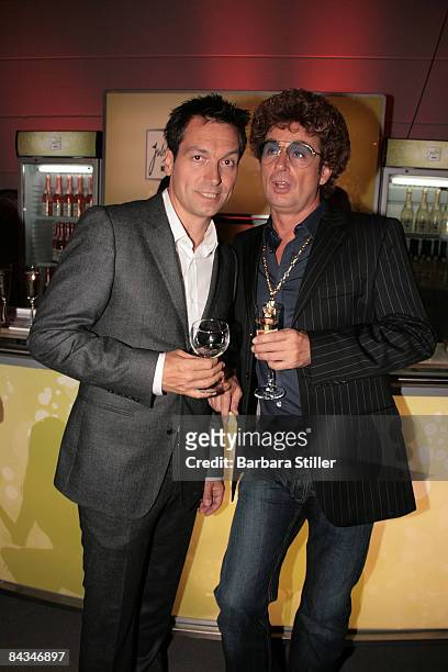 Current Comedy Award host Dieter Nuhr and former host Atze Schröder share a joke at the Comedy Award 2008 at the Coloneum in Cologne on October 21,...