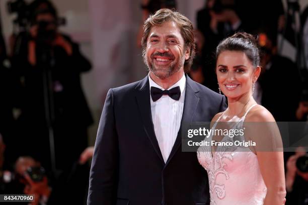 Penelope Cruz and Javier Bardem walk the red carpet ahead of the 'Loving Pablo' screening during the 74th Venice Film Festival at Sala Grande on...