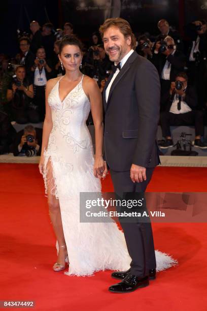 Javier Bardem and Penelope Cruz walk the red carpet ahead of the 'Loving Pablo' screening during the 74th Venice Film Festival at Sala Grande on...