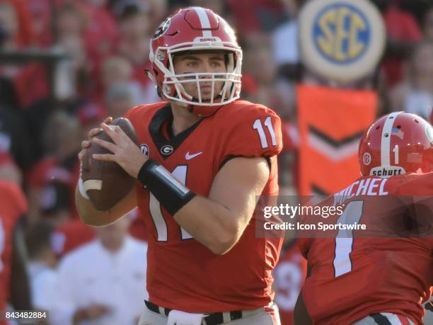 Georgia Bulldogs quarterback Jake Fromm drops sets up to pass during the game between the Appalachian State Mountaineers and the Georgia Bulldogs on...