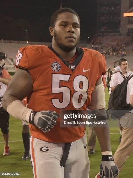 Georgia Bulldogs offensive linemen Pat Allen walks off the field after the game between the Appalachian State Mountaineers and the Georgia Bulldogs...