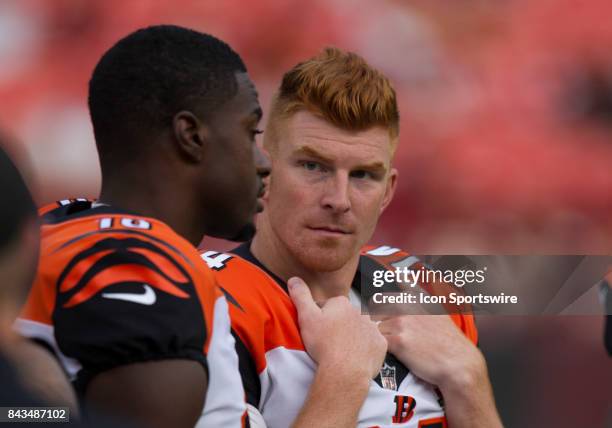 Cincinnati Bengals quarterback Andy Dalton on the sidelines chatting with wide receiver A.J. Green during the NFL preseason game between the...