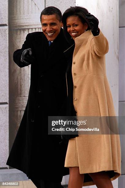 President-elect Barack Obama and his wife Michelle walk down the stairs of the Lincoln Memorial during the "We Are One: The Obama Inaugural...