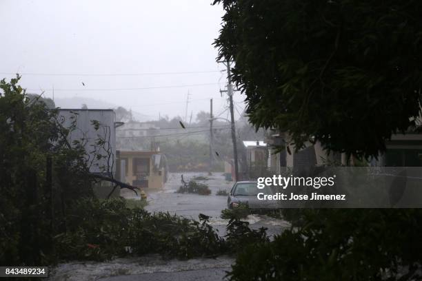 Street is flooded during the passing of Hurricane Irma on September 6, 2017 in Fajardo, Puerto Rico. The category 5 storm is expected to pass over...