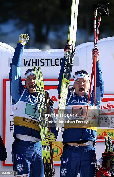 Emil Joensson and Robin Bryntesson of Sweden celebrate their victory in the Men's 6 x 1.6K F Team Sprint during day 4 of the FIS Cross Country World...