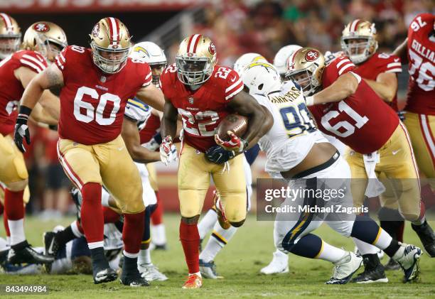 Tim Hightower of the San Francisco 49ers rushes during the game against the Los Angeles Chargers at Levi's Stadium on August 31, 2017 in Santa Clara,...